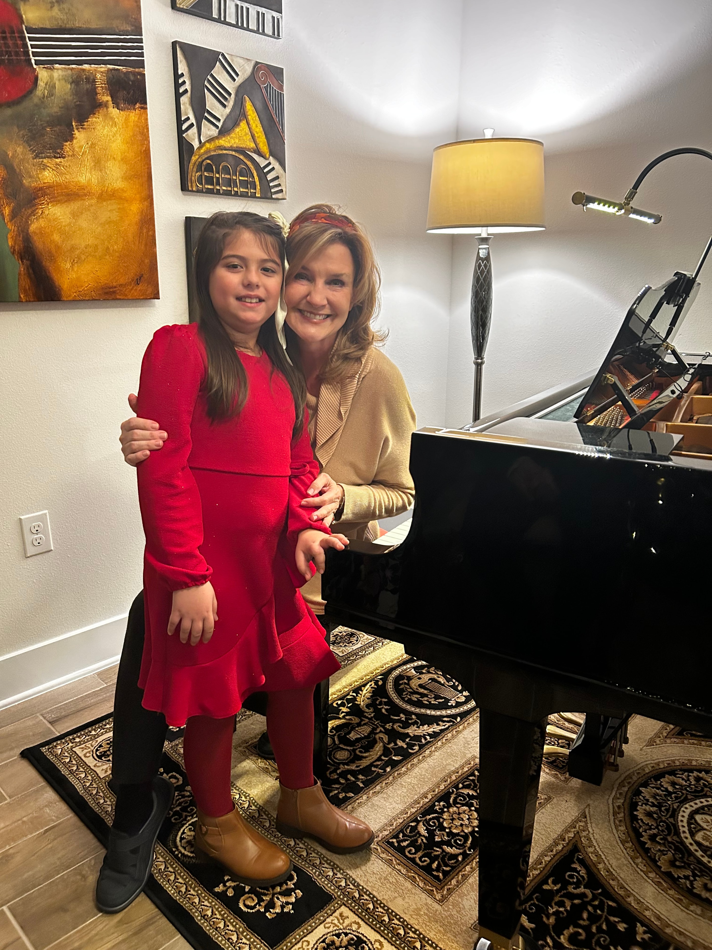 Clara with music students at a holiday recital
