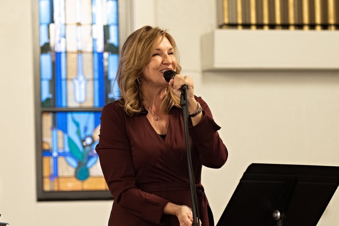 Clara teaching from the Bible
